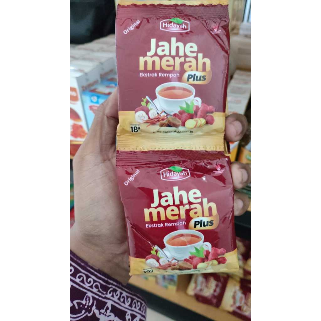 

JAHE MERAH HIDAYAH 1 RENCENG ISI 10 SACHET ORIGINAL / OLEH OLEH HAIJ DAN UMROH