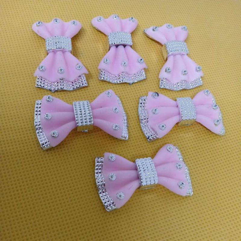 

variasi baju atau pita warna pink.per 3 pcs.