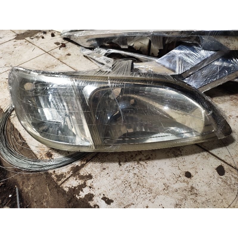 headlamp Honda city z taun 2000