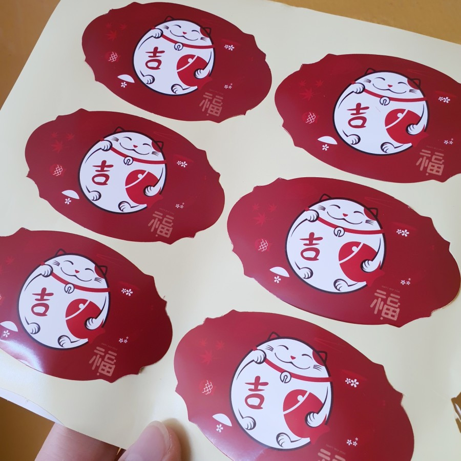 

Sticker Toples Motif Imlek Lucky Cat Oval 1 Lembar Isi 6 Pcs