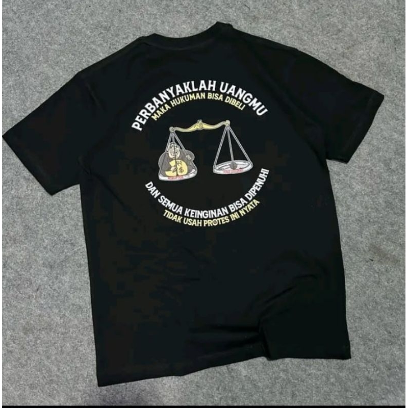 KAOS  TERBARU PERBANYALAH UANGMU MAKA HUKUMAN BISA DIBELI