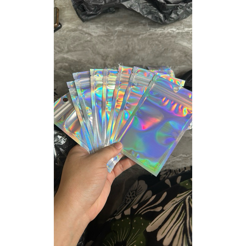 

Plastik Ziplock Hologram isi 50lbr uk 8x13cm