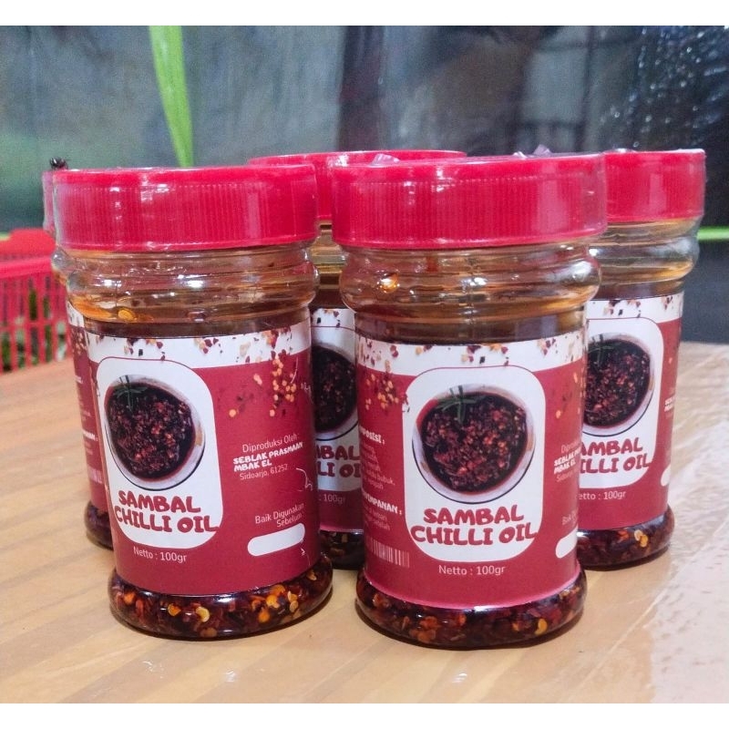 

Sambal Chilli Oil olio 100gr | cocok untuk pelengkap makanan | Dimsum | Baso Aci | Wonton| gyoza