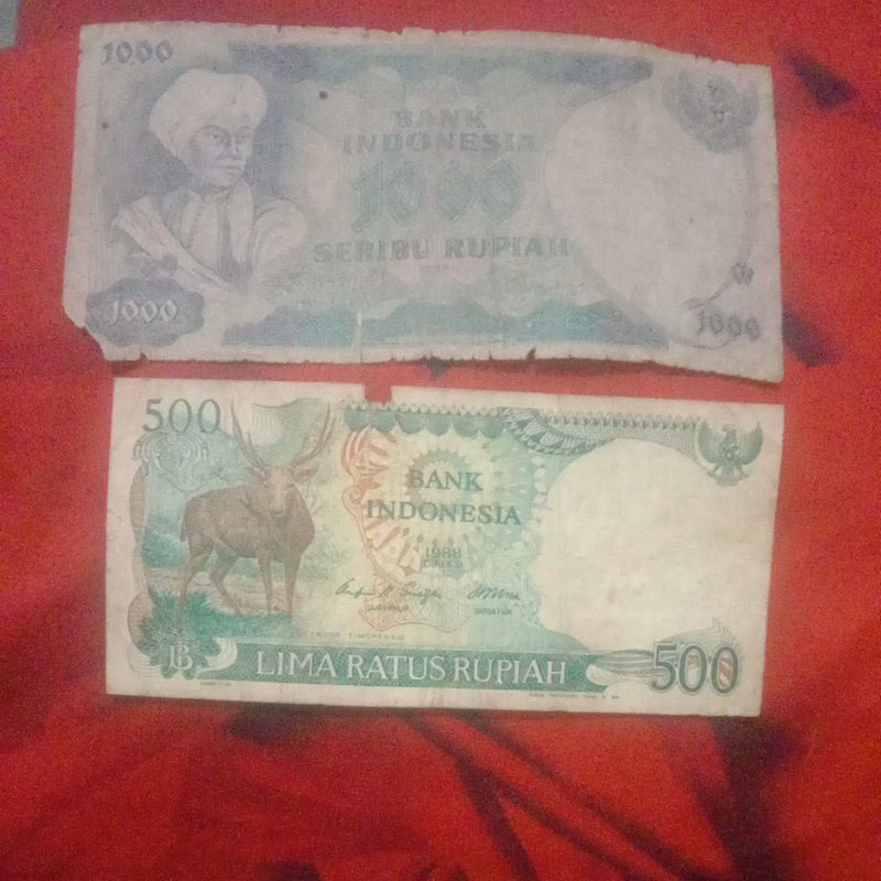 1000 rupiah dipo dan 500 kijang
