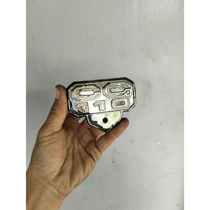Emblem Tepong aki CG 110 original copotan