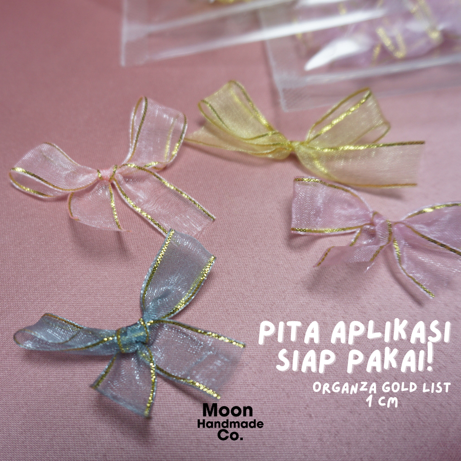 

Pita Aplikasi Organza List Gold 1 cm | Pita Jadi | Pita Polos | Pita Bahan | Pita Souvenir | Moon Handmade Co