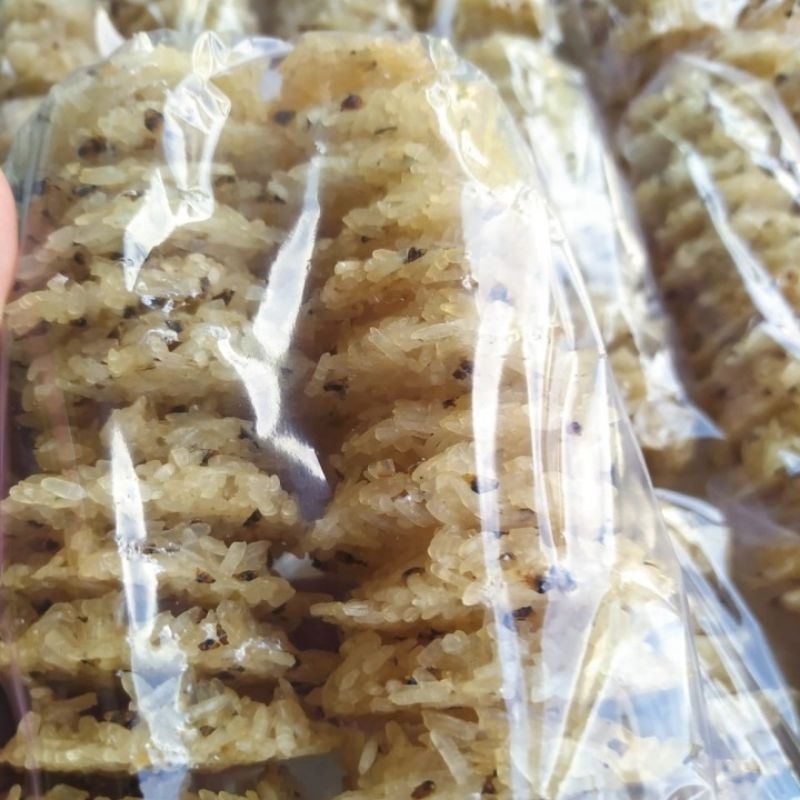 

Camilan Madura - Rengginang Kerang Isi 25 Keping/pack