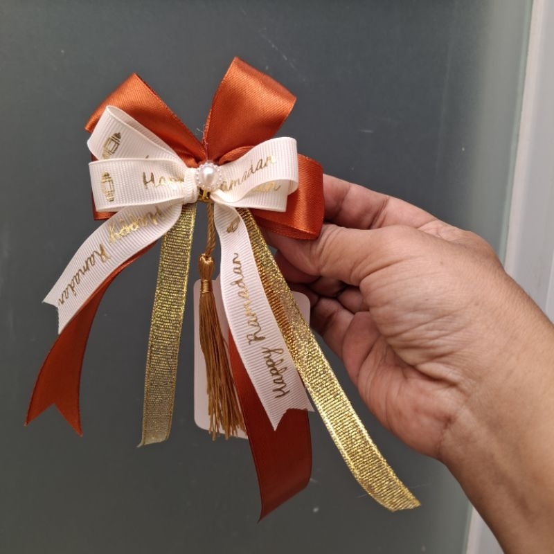 

Pita Hampers instan Lebaran lucu tassel gold orange