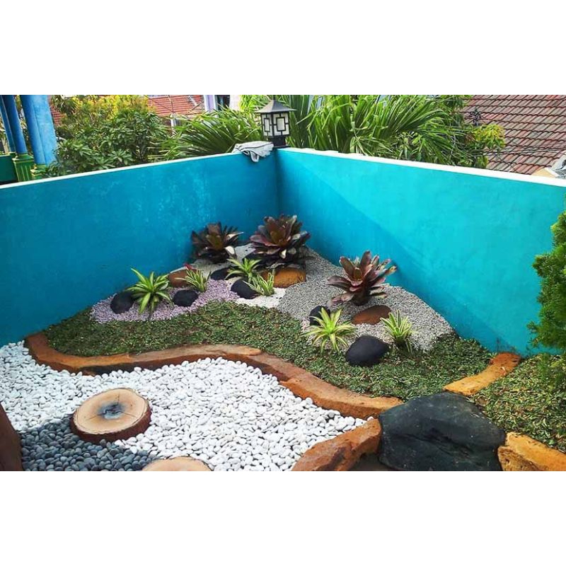 Taman rumput/relief batang kayu
