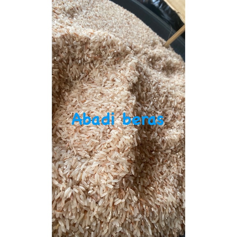

beras pink organik beras sosoh( beras merah pulen ) kemasan 1 kg vaccum