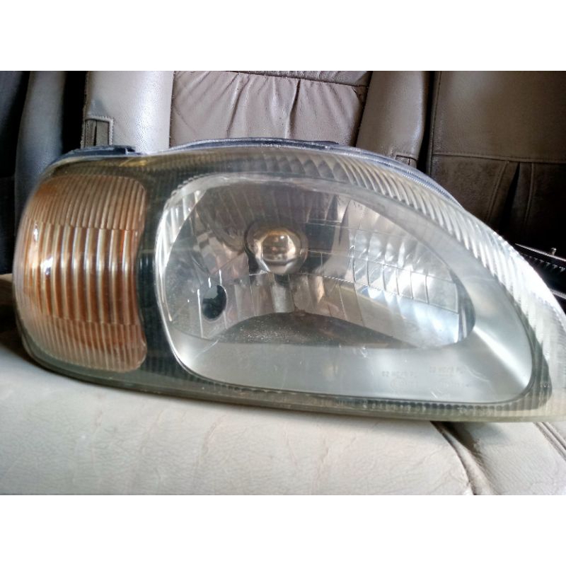 Headlamp kanan baleno 2000