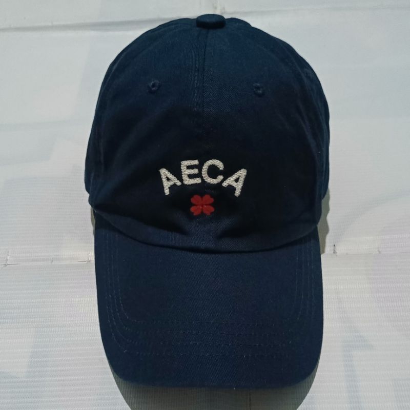 Aeca white clover logo cap
