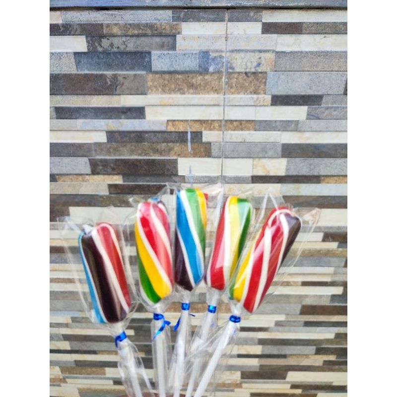 

PERMEN LOLIPOP BENTUK LILIN SATU PACK ISI 20 PCS