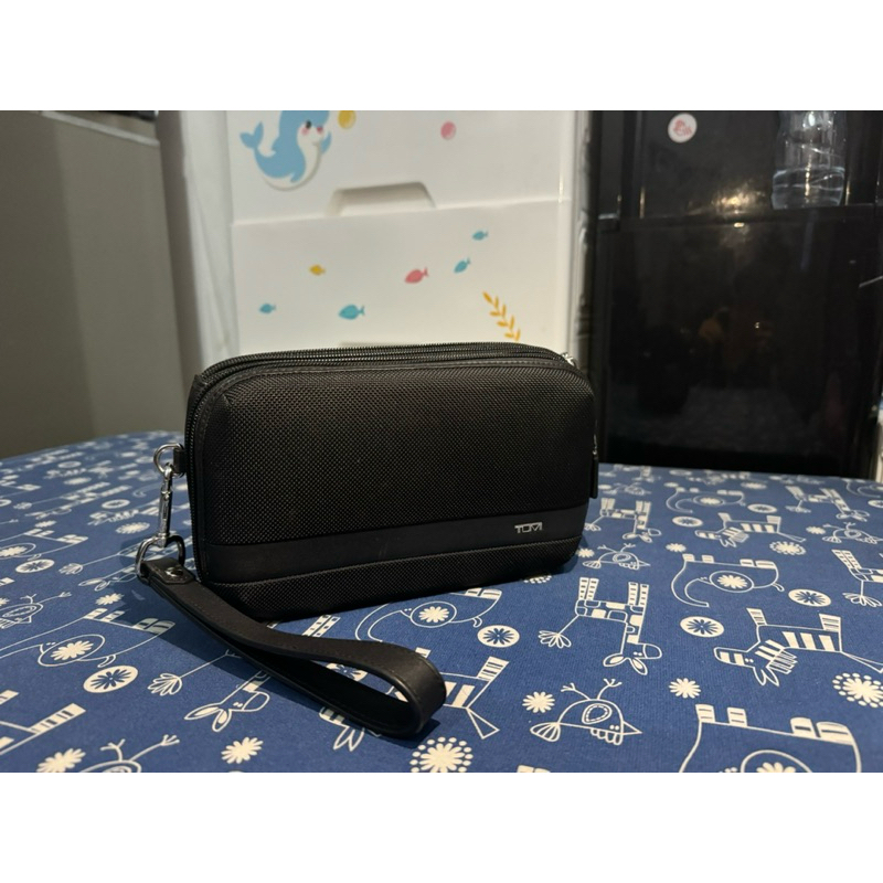 CLUTCH TUMI ORIGINAL