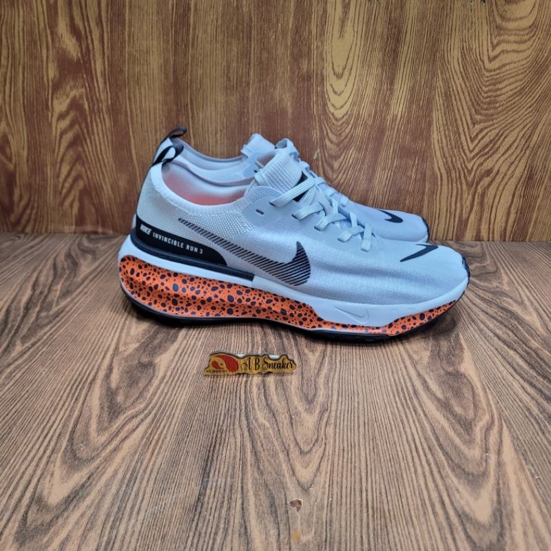 NIKE ZOOMX INVICIBLE GREY ORANGE