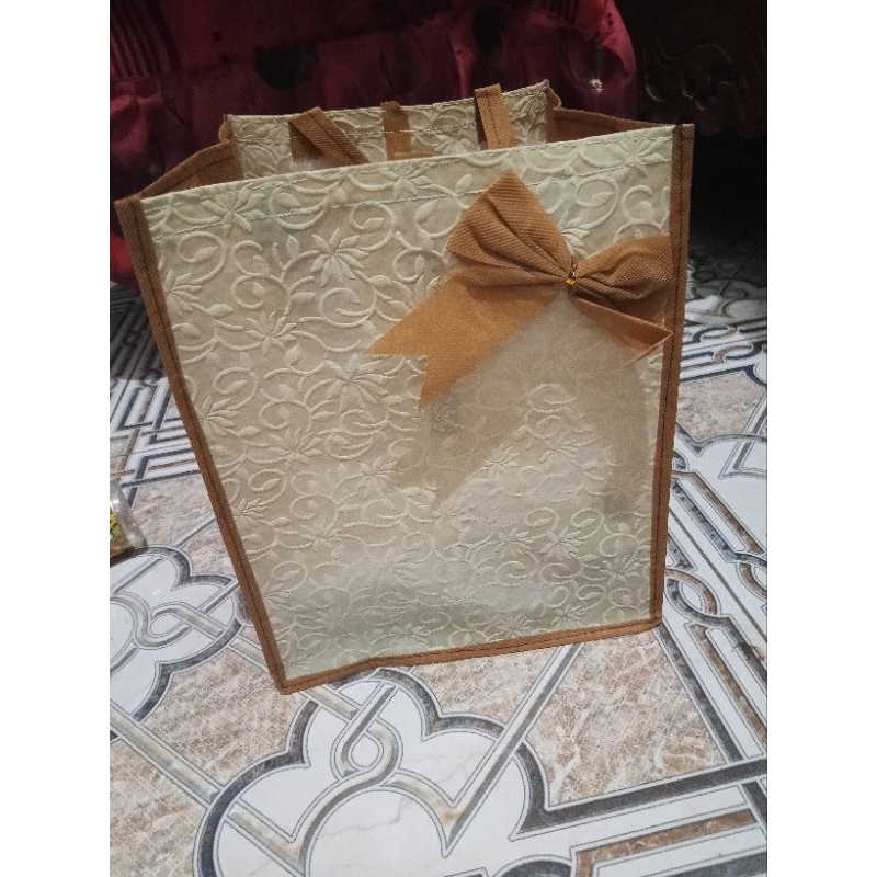 tas embos spunbond harga per lusin