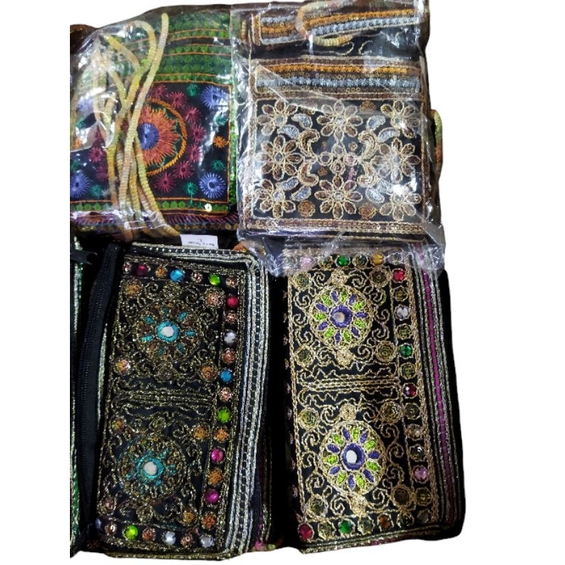 TAS DOMPET OLEH-OLEH HAJI UMROH