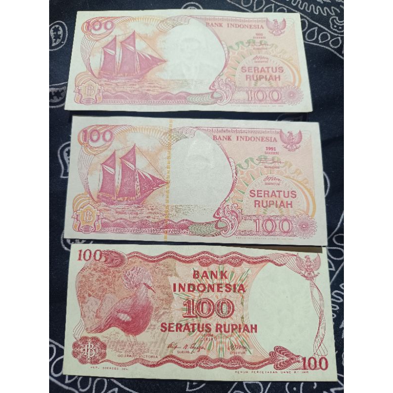UANG KUNO 100 RUPIAH PERAHU PINISI DAN BURUNG