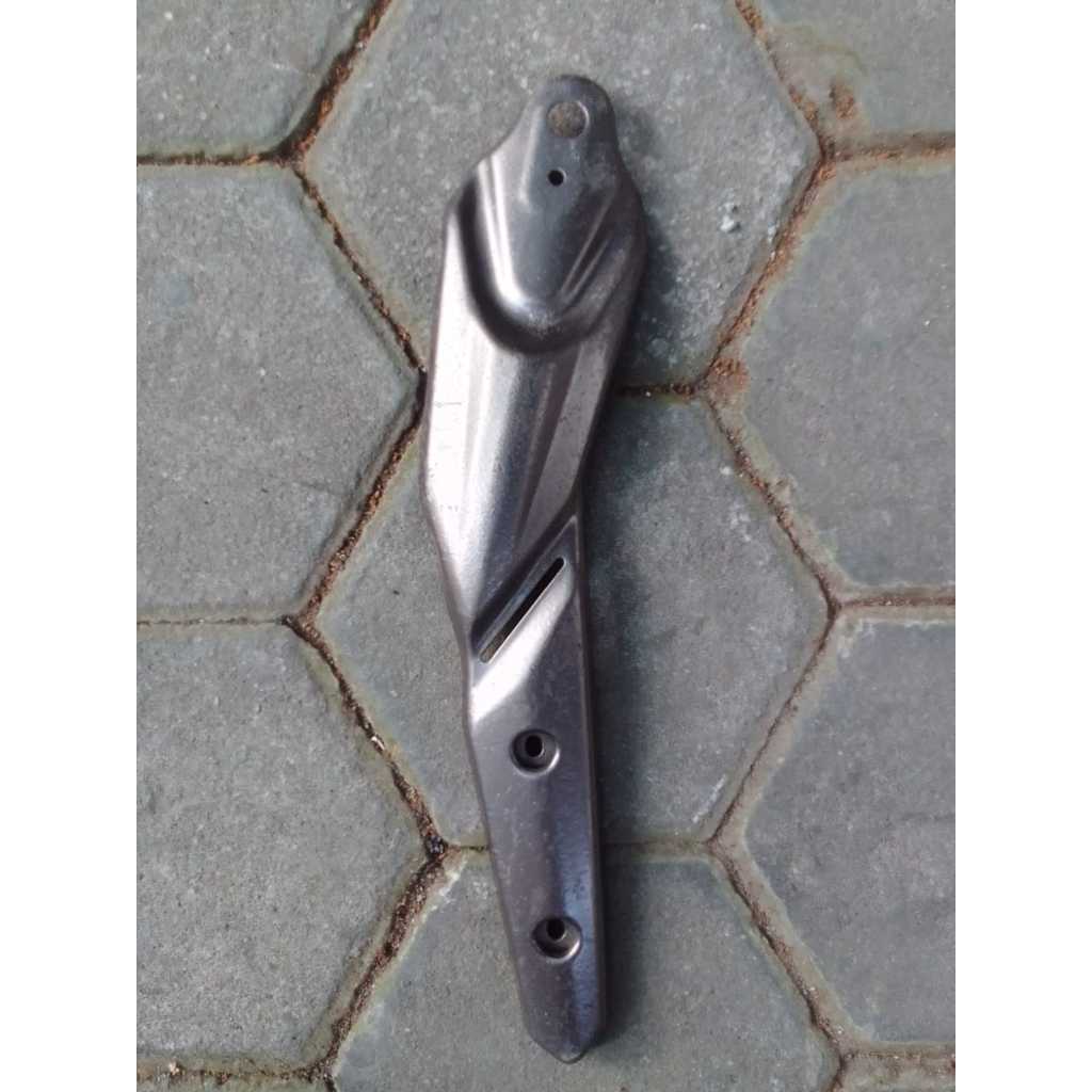 Tameng tutup knalpot bagian depan Jupiter Mx New 135 ORIGINAL