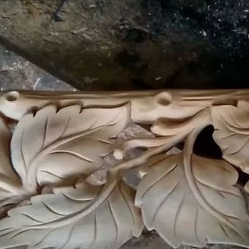 kayu ukir motif daun
