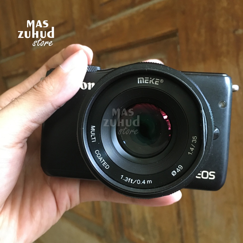 Kamera canon eos m10 bekas dan lensa meike 35mm