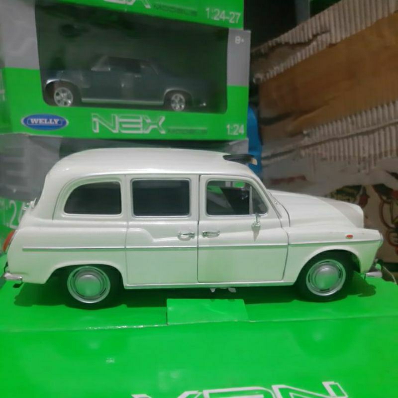 Diecast Welly Skala 1:24 Austin FX London Taxi Putih Baru Bukan Bekas