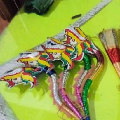 mainan terompet karakter  naga