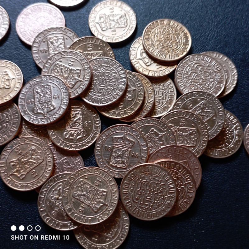 ½ sen uang koin kuno indonesia bekas detail bagus utuh asli
