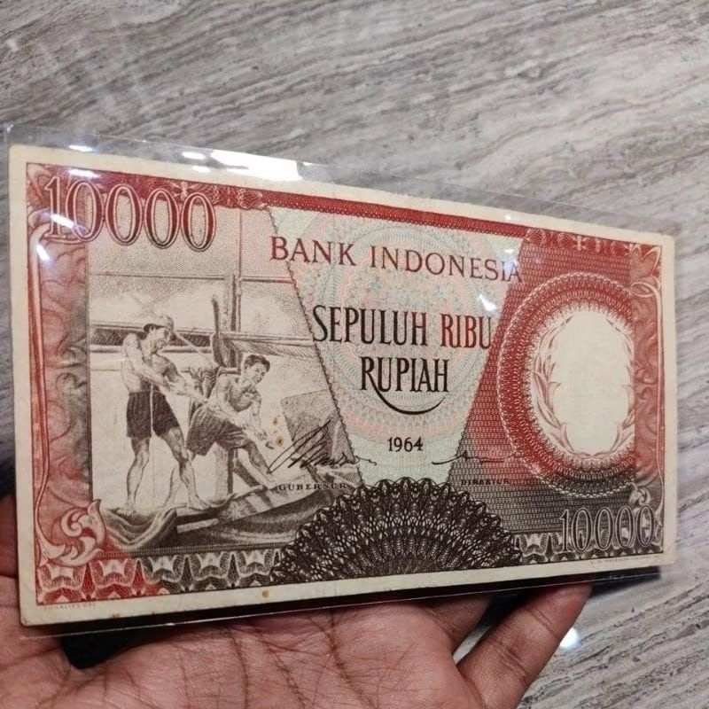 10000 rupiah pekerja merah 1964 asli sesuai foto