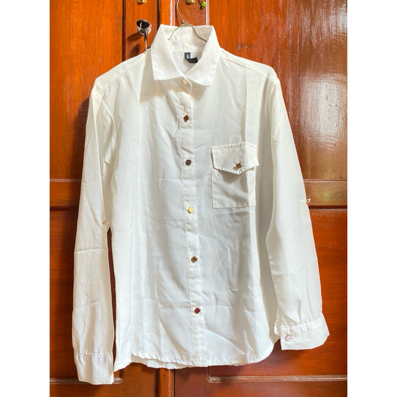 kemeja putih wanita brand twinkle