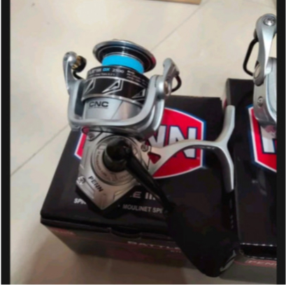 Gulungan Senar Pancing Rel Rell Penn Battle III dx Series Silver 2500 Power Handelreel dari penn bat