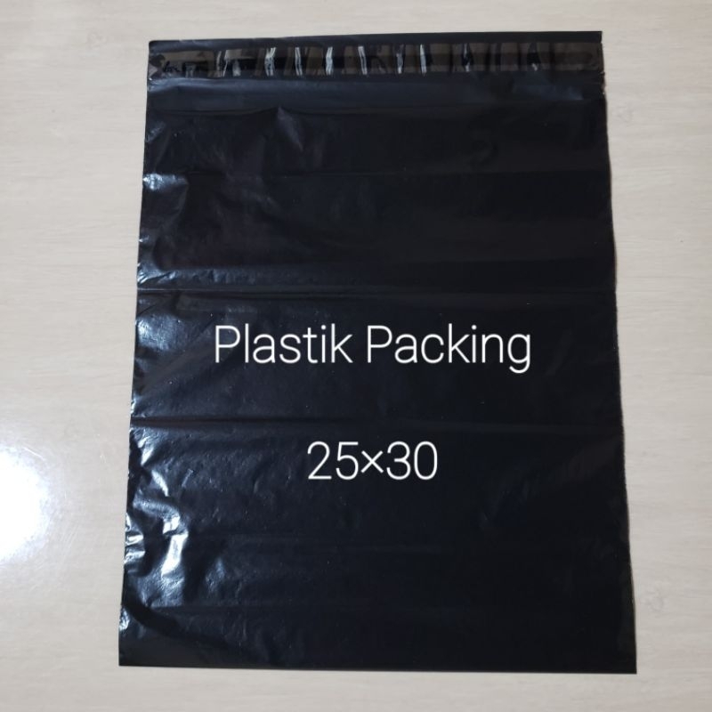 

plastik packing hitam plus perekat