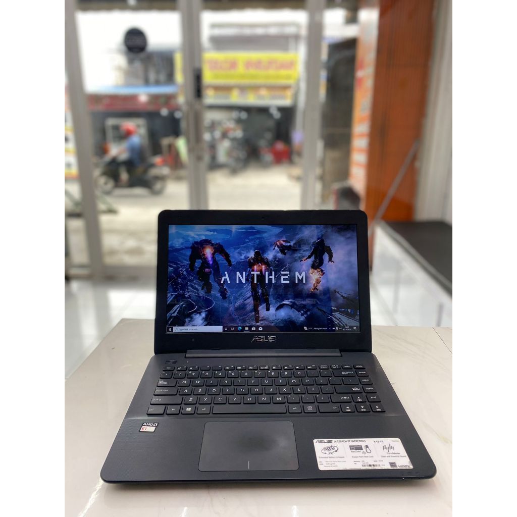 ASUS X454Y AMD E1-7010 APU with AMD RADEON R2 GRAPHICS RAM 4GB SSD 128 GB