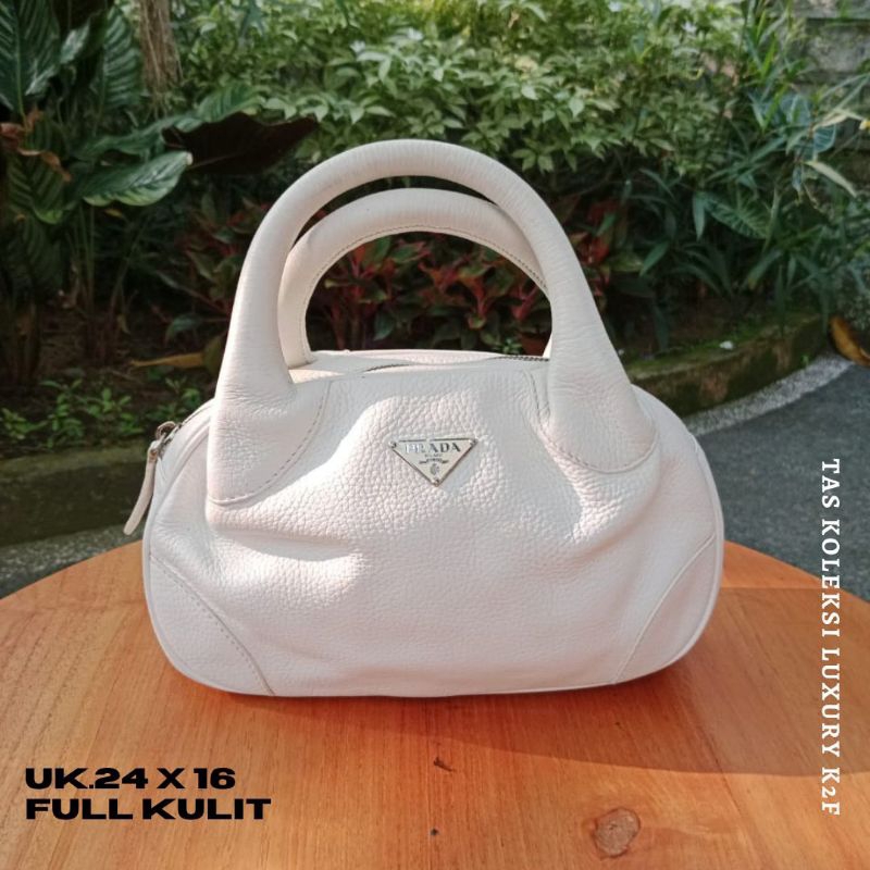 TAS wanita preloved branded Prada*, kulit asli lentur balik zip lempo limited edition