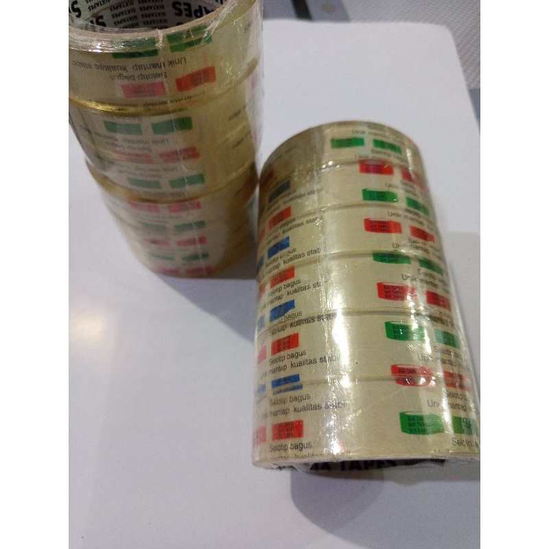 

(1 SLOP ISI 6 ) LAKBAN OPP 24mm bening Six tape