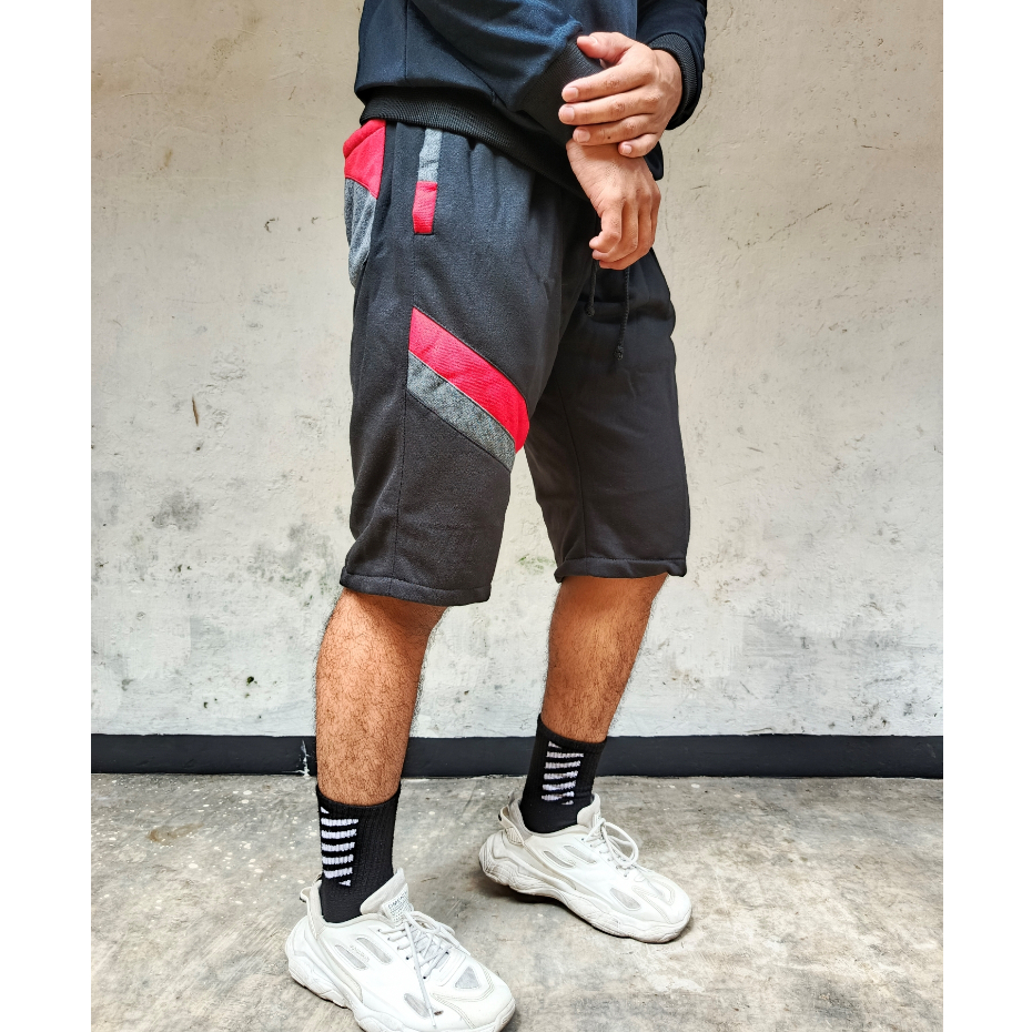 Celana pendek santai pria panjang selutut motif warna