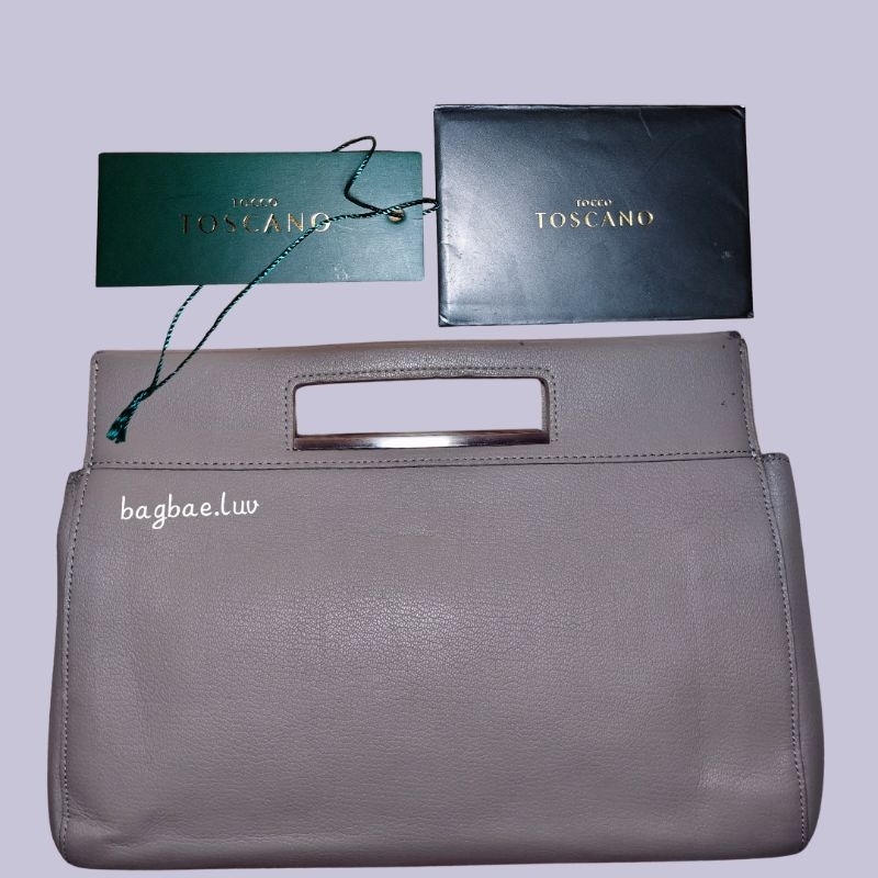 Authentic Tocco Toscano handbag.