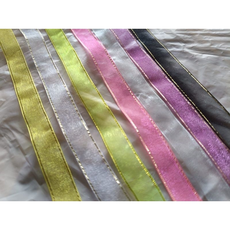 

pita organdi ukuran 1cm ,harga 1 roll 8000 dengan ukuran 25 yard