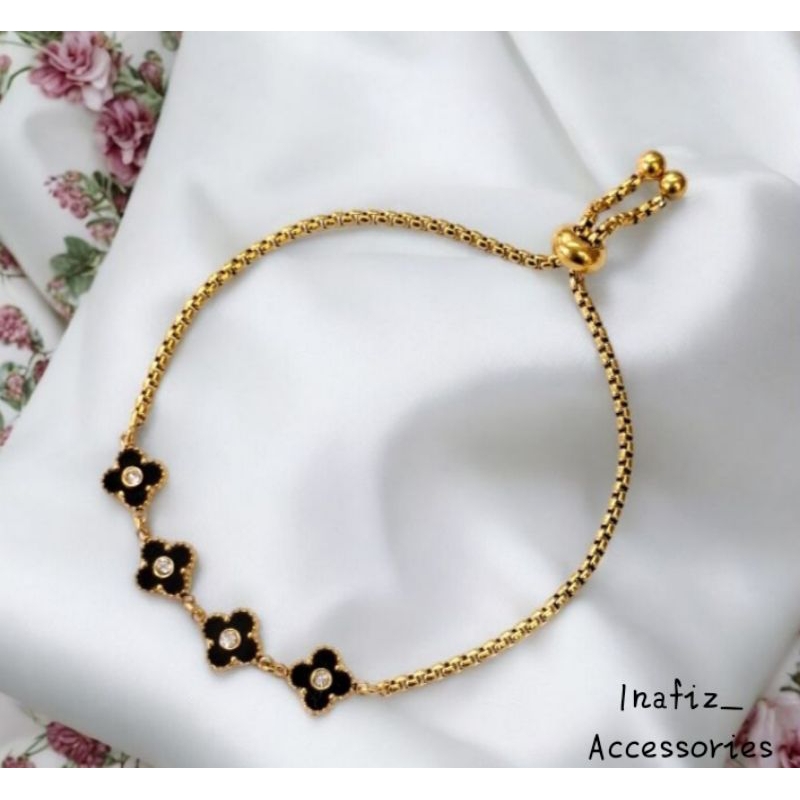 New gelang tangan titanium gold wanita serut four black flowers