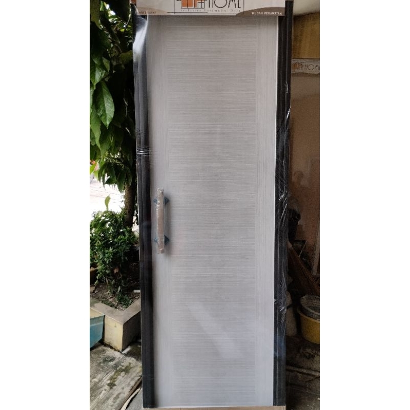 Pintu Pvc motif dengan handle pintu kamar mandi
