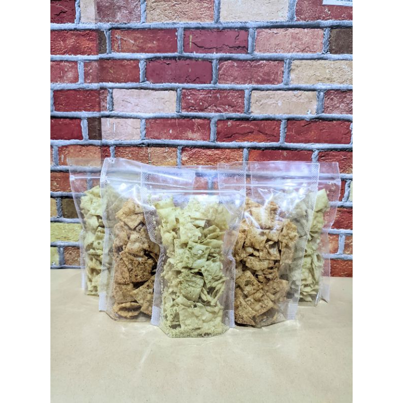 

Keripik Pangsit Asin/Pedas Daun Jeruk Kemasan Pouch 100gr.