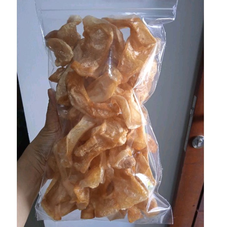 

Fresh dari tungku kerupuk jangek kulit kerbau potongan besar khas Kumango Batusangakar