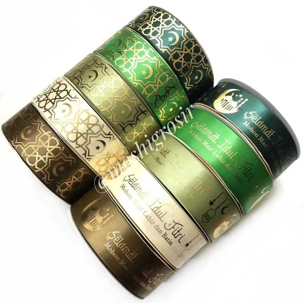 

1 ROLL ( 50 YARD ) - PITA SATIN TULISAN IDUL FITRI / PITA LEBARAN / PITA IDUL FITRI SABLON EMAS TIMBUL