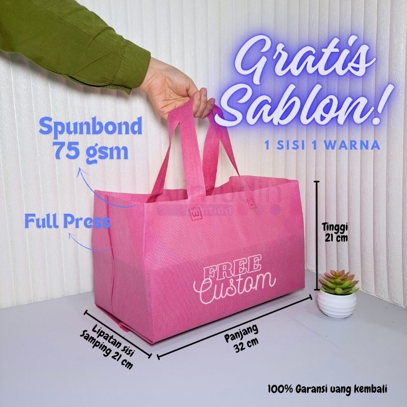 

Goodie Bag 32 × 21 × 21 Tas Spunbond Box Kue Holan Bakery Handle Lipat Samping Custom Sablon