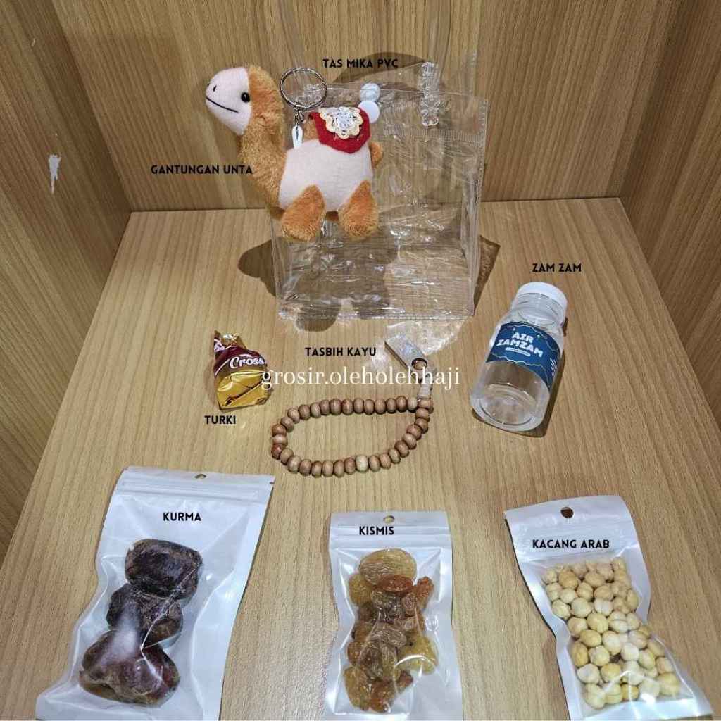 

Paket oleh oleh Haji Dan Umroh Eksklusif Tas Goodie Bag Totebag Transparan Coklat Turki Tasbih series Gantungan Kunci Unta dan Kabah