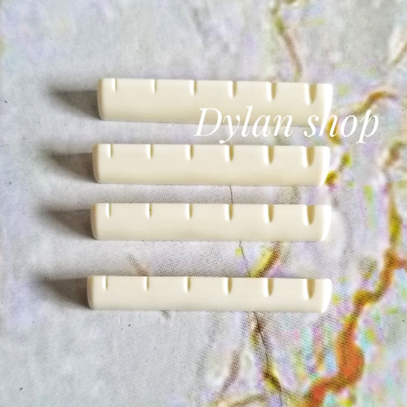 NUT GITAR AKUSTIK PENYANGGAH SENAR GITAR BAGUS