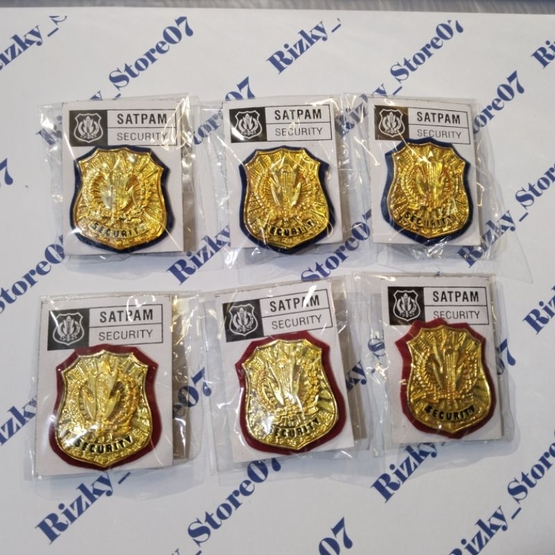 pin Satpam baju safari paku