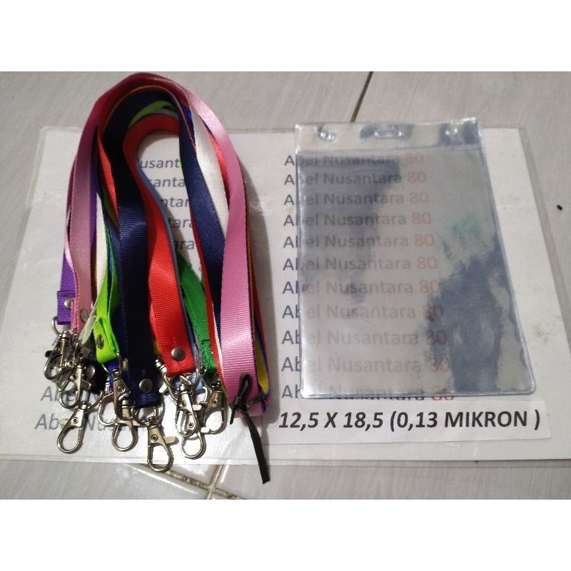 

paket Tali 1, 5 cm polos+plastik panitia uk 12,5x18, 5 cm isi paket 10 pcs tebal plastik 0, 13 mikron