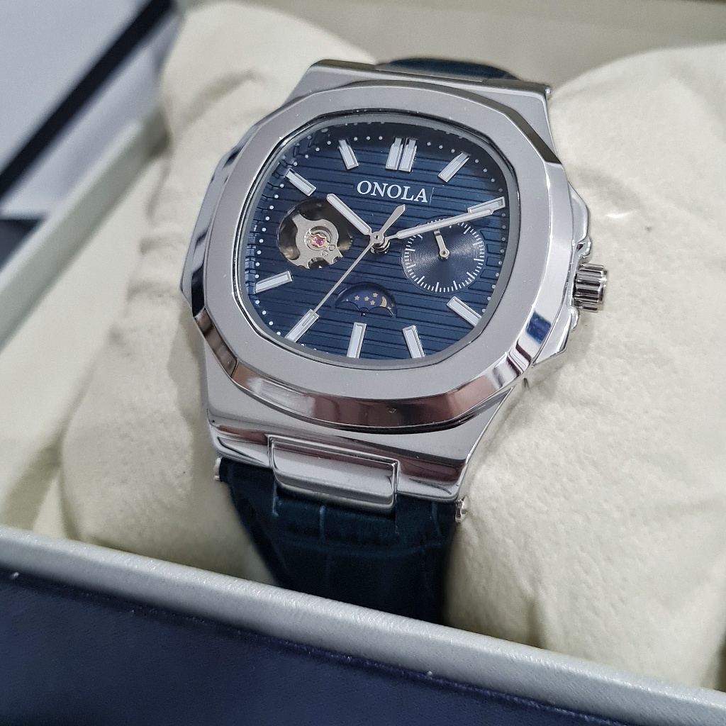 ONOLA Squadron Jam Tangan Pria Original Otomatis Tanpa Baterai Silver Biru Anti Air Skeleton