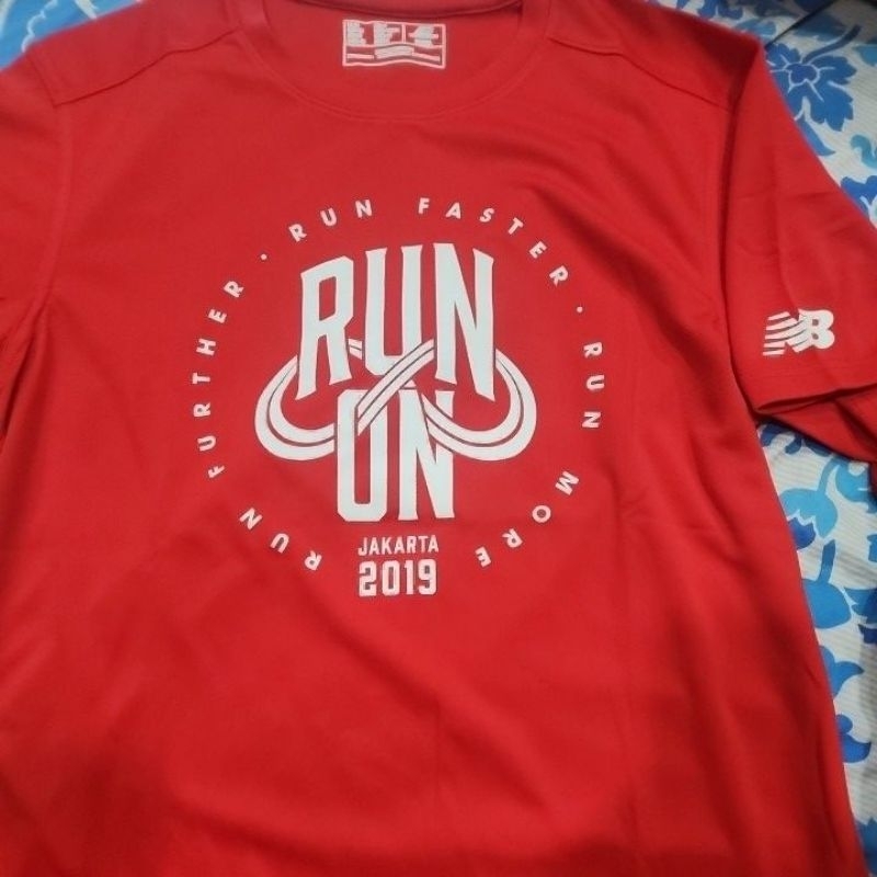 jersey New Balance Run On size S
